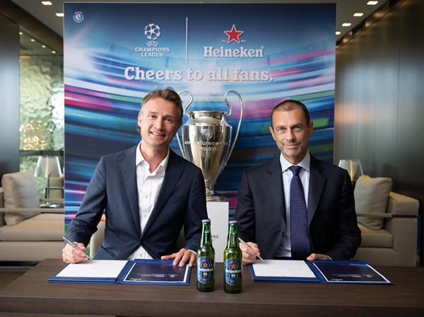 Dolf van den Brink CEO at Heineken and Aleksander Čeferin President of UEFA
