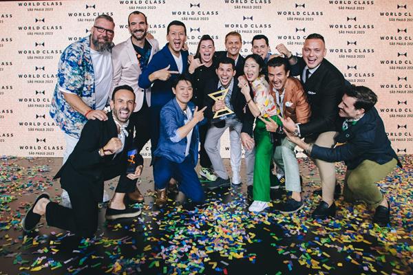 Jacob Martin from Canada is crowned winner of the World Class Global Bartender of the Year 2023 and celebrates with previous World Class winners. (Image provided by Diageo PLC)