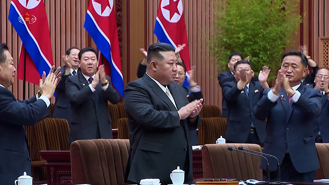 North Korean leader Kim Jong-un (C) claps during the ninth session of the 14th Supreme People's Assembly held on Sept. 26-27 in Pyongyang, in this photo captured from Pyongyang's official Korean Central Television on Sept. 28. (Image courtesy of Yonhap)