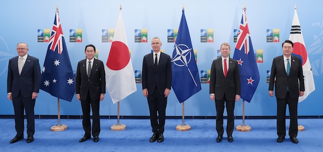 The leaders of the Asia-Pacific Partnership, also known as AP4, a group of four key Asia-Pacific partner countries of the North Atlantic Treaty Organization (NATO) -- South Korea, Japan, Australia and New Zealand -- pose for a photo with NATO Secretary General Jens Stoltenberg (C) at the venue of a NATO summit in Vilnius, Lithuania, on July 12, 2023. From left are Anthony Albanese of Australia, Fumio Kishida of Japan, Stoltenberg, Chris Hipkins of New Zealand and Yoon Suk Yeol of South Korea. (Image courtesy of Yonhap) 