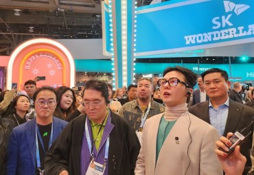 K-pop Star G-Dragon Visits Exhibition Booths at CES 2024
