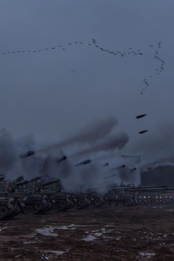 The Army conducted live-fire artillery and mechanized unit maneuver drills  23