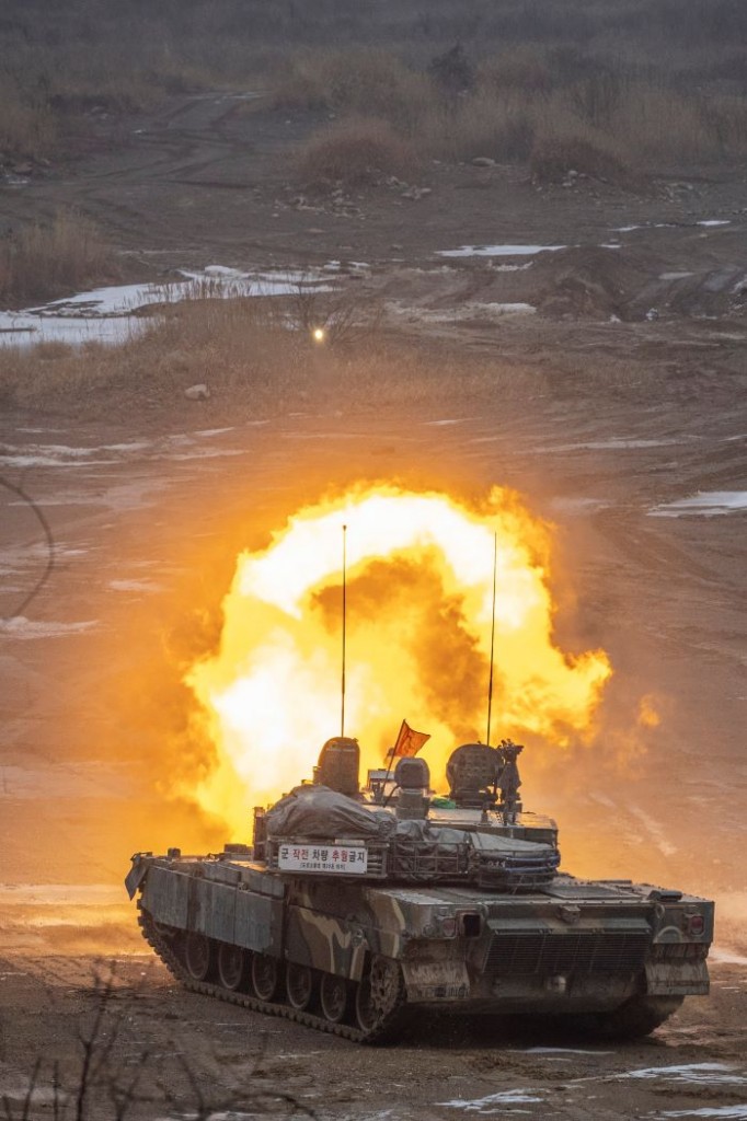 The Army conducted live-fire artillery and mechanized unit maneuver drills  25