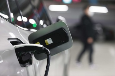 Controversy Surrounds Electric Vehicle Subsidies Amid Allegations of Favoritism Towards Domestic Brands