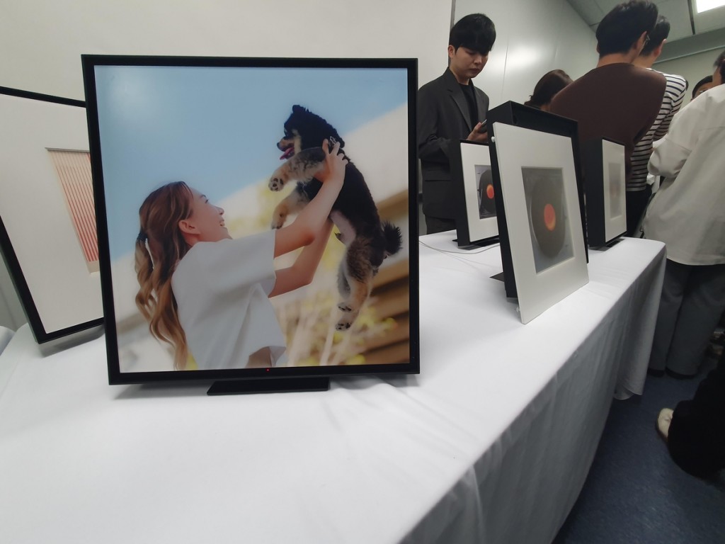 The product, called the Music Frame, looks every bit like a standard picture frame when hung on a wall or placed on a surface. (Image courtesy of Samsung Electronics)