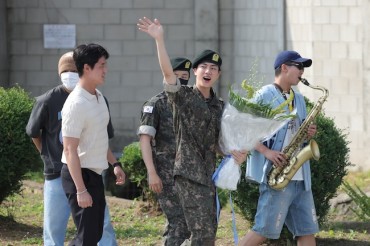 BTS’ Jin Returns from Military Duty amid Warm Welcome from Bandmates