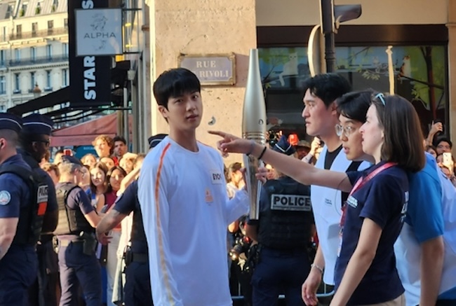 BTS’ Jin Carries Paris Olympics Torch amid Cheers from Thousands of Fans