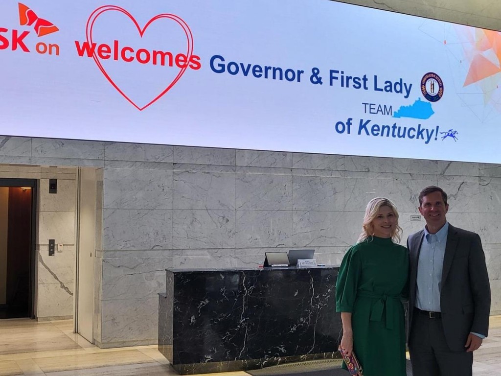 This photo taken July 15, 2024, shows Kentucky Gov. Andy Beshear (R) and his wife at SK Group's headquarters in Jongno, central Seoul. (Yonhap)