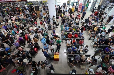 Economic Strain Forces Half of South Korean Workers to Forgo Summer Vacations, Survey Finds