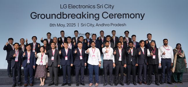Officials of LG Electronics Inc. and local Indian governments pose for a photo during a groundbreaking ceremony to build a new home appliance factory in India's Sri City, an industrial hub in the eastern state of Andhra Pradesh, on May 8, 2025, in this photo provided by the company. (Yonhap)