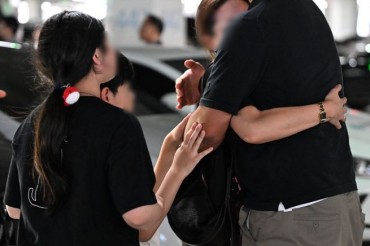 “Like Criminals”: South Korean Workers Recount Harrowing Detention in the U.S.