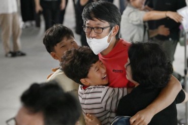 Tears, Relief and Lingering Questions as Detained Korean Workers Return from U.S.