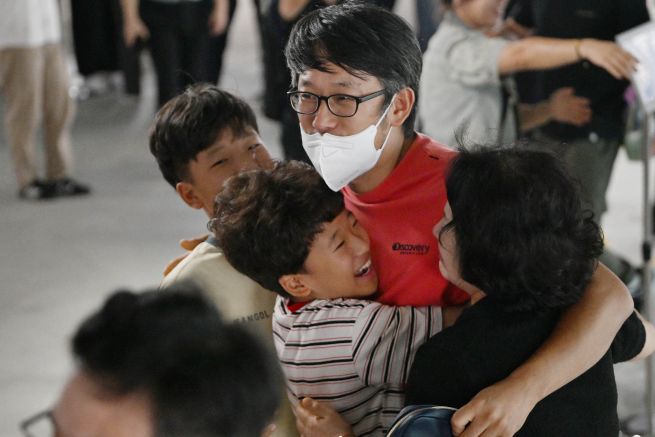 Tears, Relief and Lingering Questions as Detained Korean Workers Return from U.S.