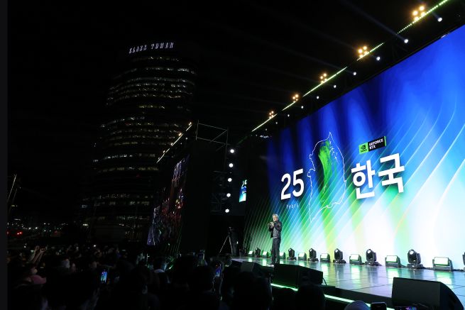 Nvidia CEO Jensen Huang speaks from the podium during the 25th-anniversary event for the company’s GeForce GPU lineup, held at COEX in Seoul on October 30. (Yonhap)