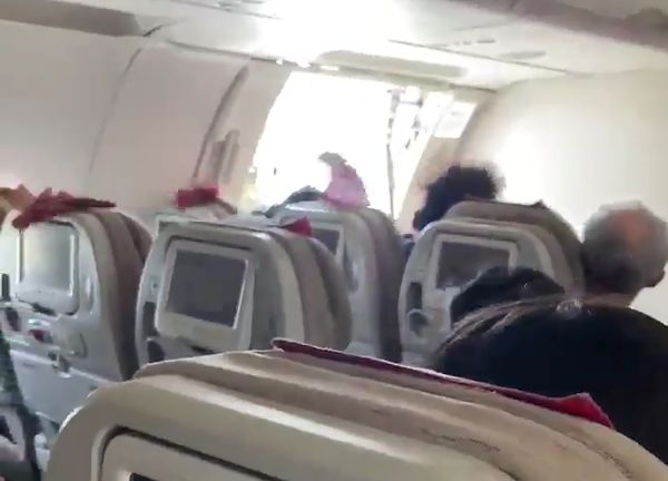 This photo, provided by a reader, shows the interior of an Asiana Airlines plane, one of whose doors suddenly opened right before landing at Daegu International Airport, about 240 kilometers southeast of Seoul, at 12:45 p.m. on May 26, 2023. The plane carrying 194 people landed safely, but some panicked passengers showed symptoms of breathing difficulty and were immediately taken to a hospital. (Yonhap)